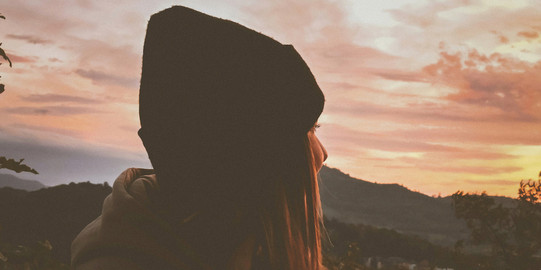 A person is looking at the sky.